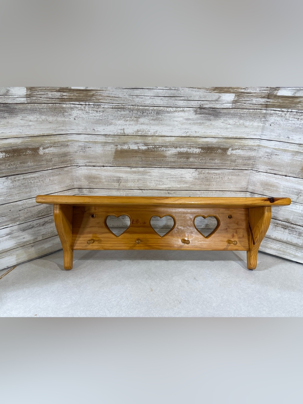Vintage wood trinket shelf with heart cut outs